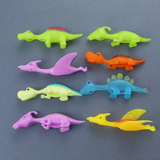Kreativ dinosaurie-fingerkatapult som stressleksak